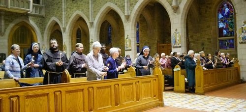 Religious renewing their vows before the offertory Religious renewing their vows before the offertory